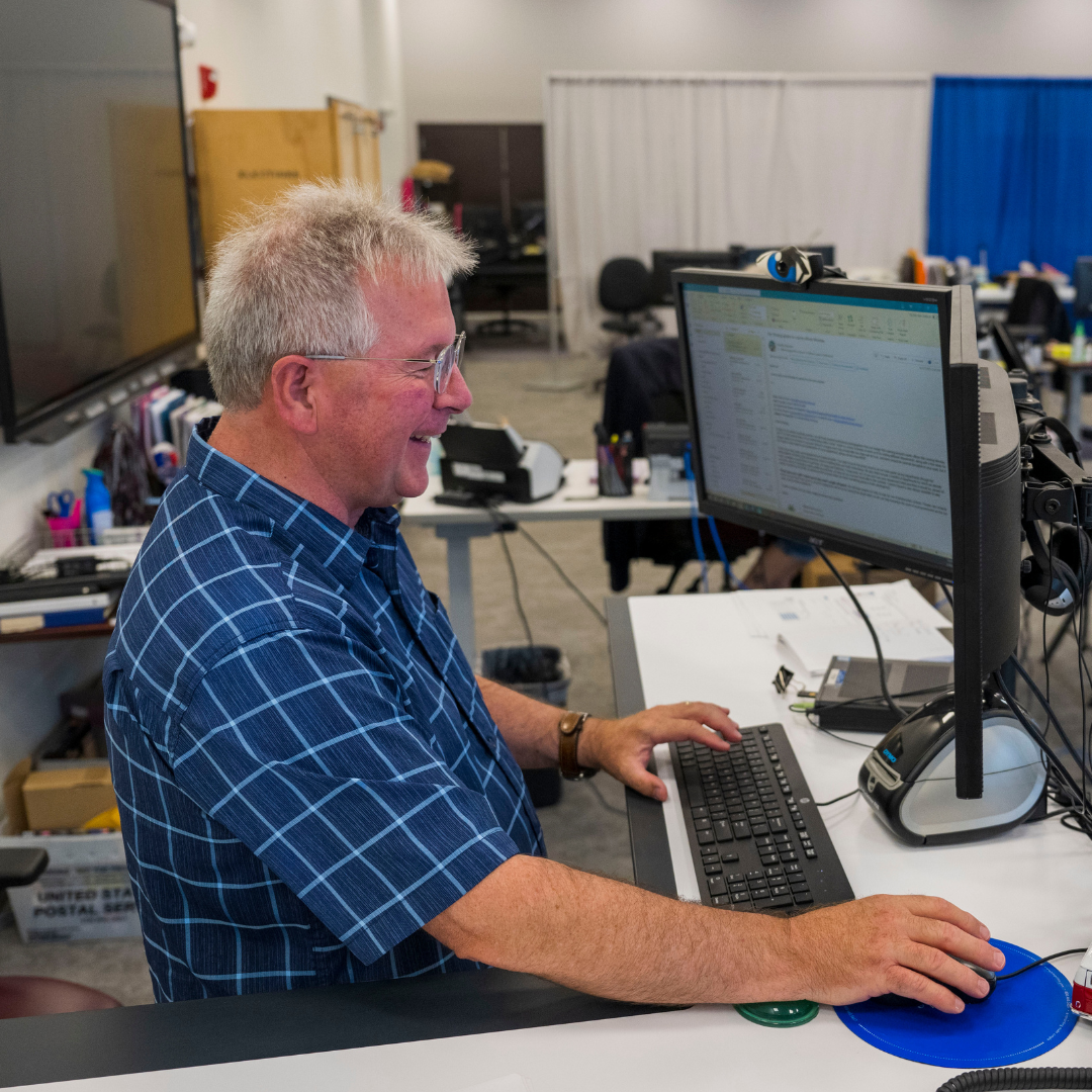 Election Worker Wearing Blue Shirt